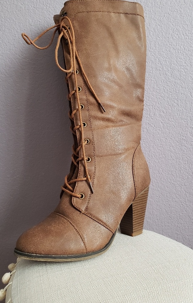 Knee high lace up boots